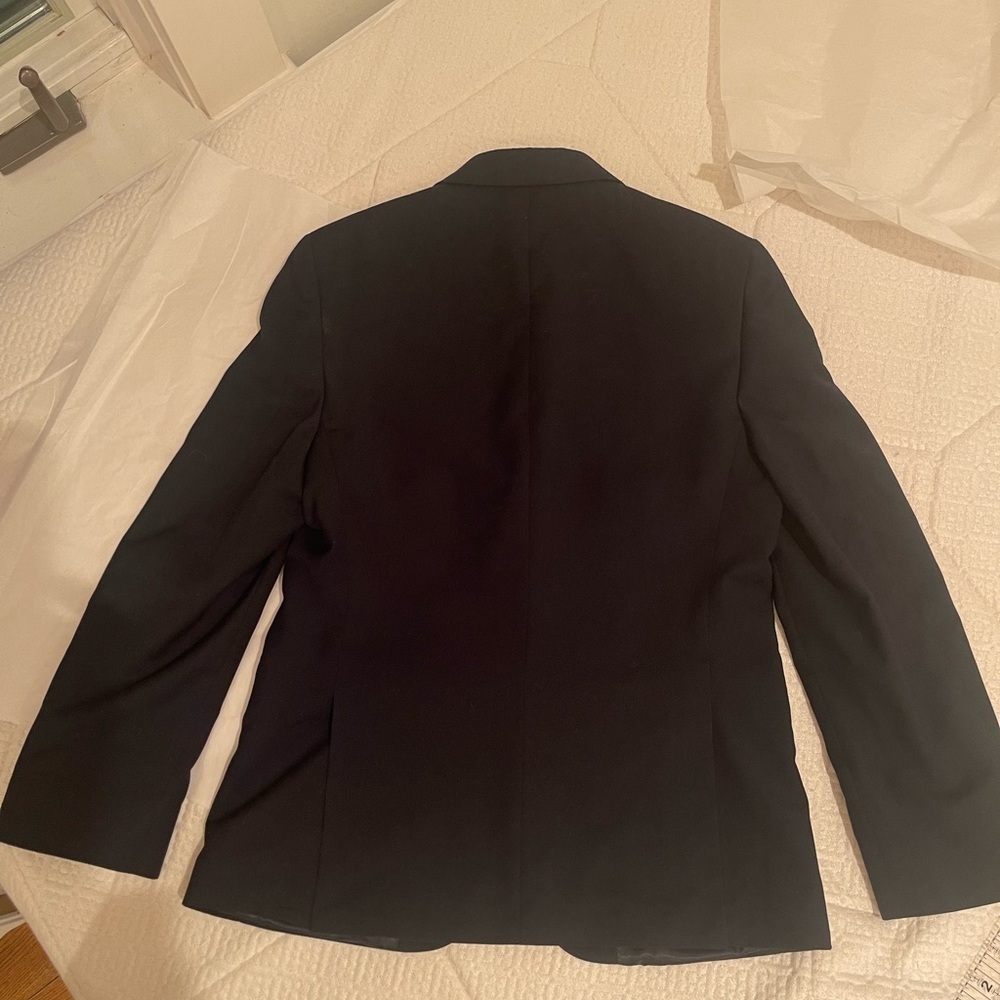 Boys sports coat never worn.